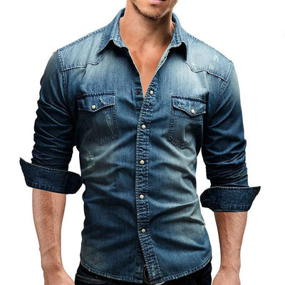 a man wearing a denim shirt and jeans